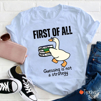 First Of All Guessing Is Not A Strategy Teacher T-Shirt